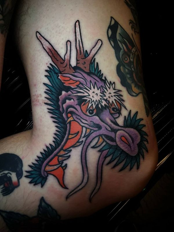 Tattoo from Uncommon Tattoos by Reis.