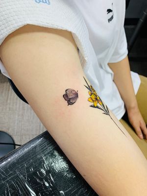 mini butterfly tattoo up