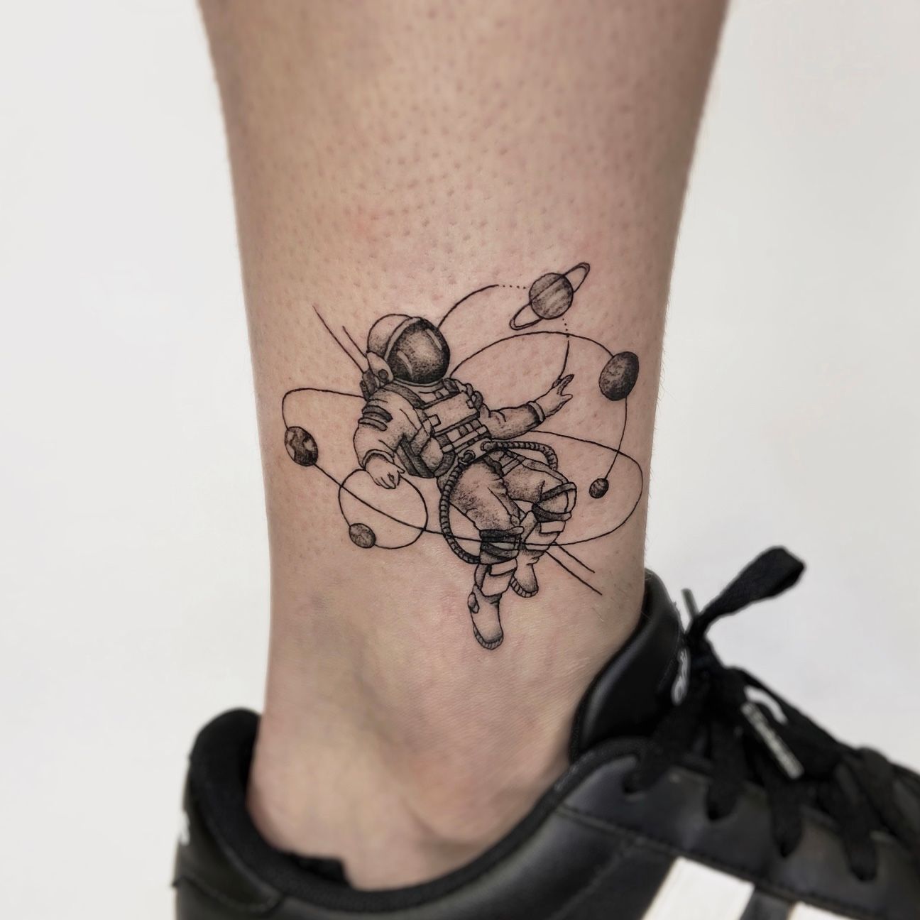 x-post from r/tattoos - My geometric astronaut tattoo by Murrt,  Philadelphia : r/pics