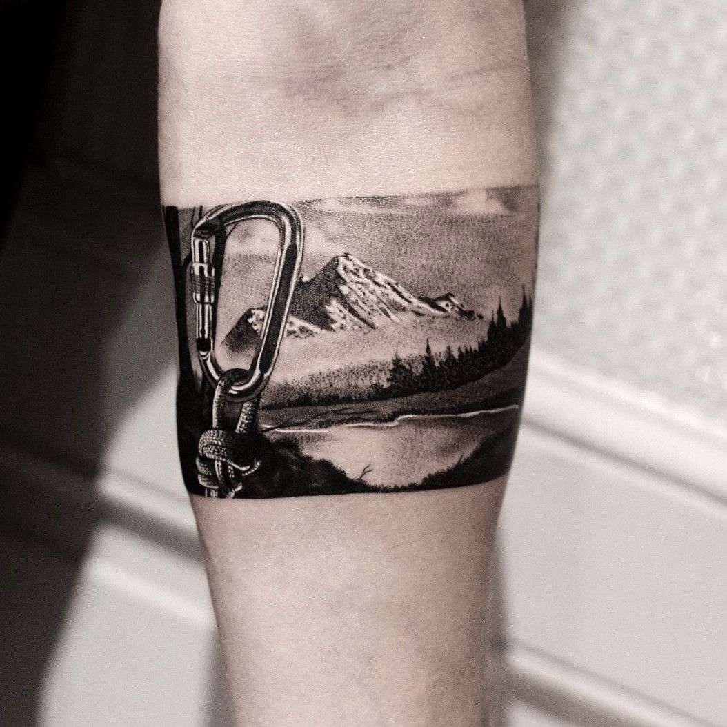 Tattoo uploaded by Claire • By #PontoTattoo #handpoked #mountains #snow # armband #patagoniaAR • Tattoodo