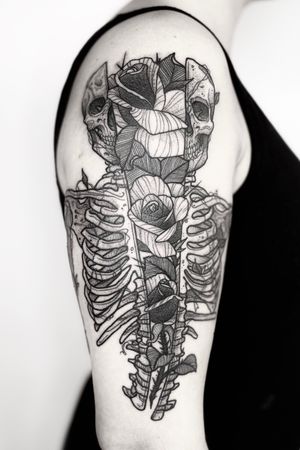 // Broken skeleton with roses. 