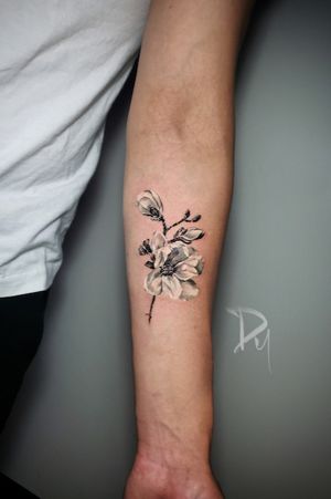 magnolia flower tattoo by tattoo artist Dylan C in Montreal. #Fineline