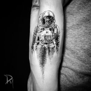 Black and grey fading astronaut tattoo made by Dylan C, Tattoo artist Montreal