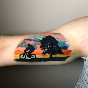 Cycling silhouette tattoo, the background based on my painting.