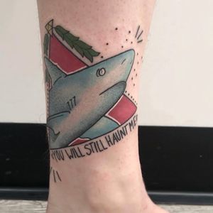 Shark tattoo based on the client's friend drawing.