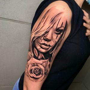 Realistic girl face and rose.