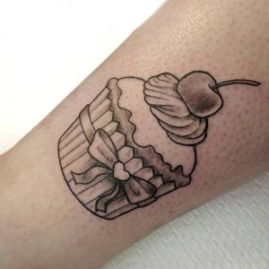 Black and gray cupcake on ankle