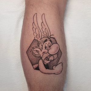 Asterix cartoon tattoo on calf