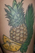 Colored tropical thigh tattoo- Pineapple and palm leaves #pineapple #fruit #tropical #monstera #pineappletattoo #foodtattoo #tropicaltattoo #thightattoo #palmleaf #leaves #plant #nature