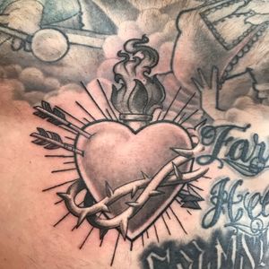 Sacred heart custom chest tattoo. 