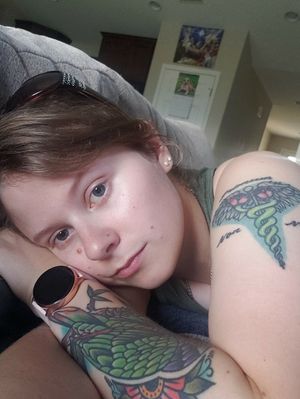 Two of my tats and my face
