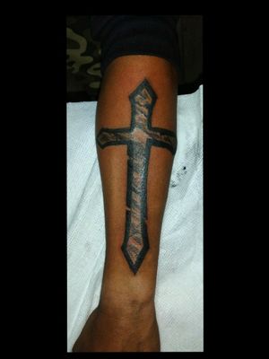 Latin cross tattoo