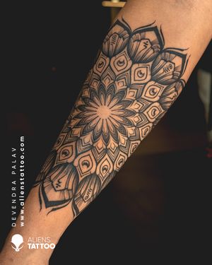  Mandala Tattoo by Devendra Palav at Aliens Tattoo India   Mandala means, “Life of a Flower.” If you like your flowers to be of different shapes and styles, then you are sure to love the Mandala tattoo. The Mandala is an eye-catching tattoo one that you can’t ignore. 