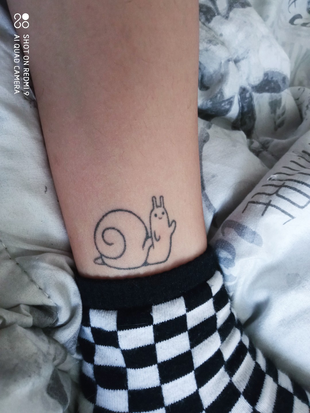 Sudarezz on X Heres the tattoo  its the waving snail from adventure  time httpstcohbNELUmGSC  X