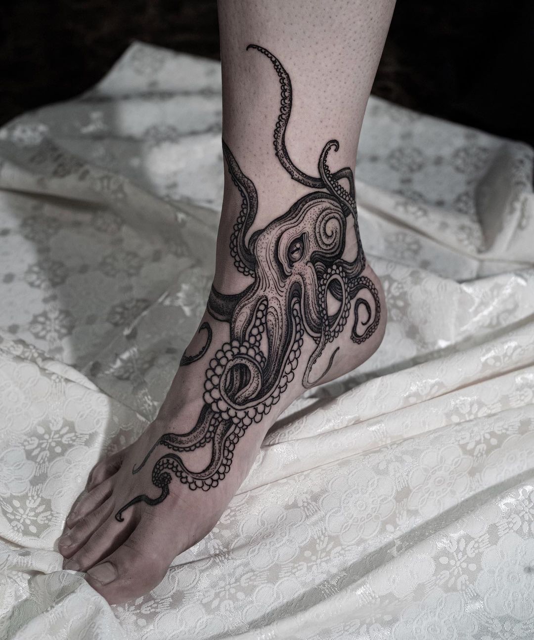 a male tattoo of a large octopus