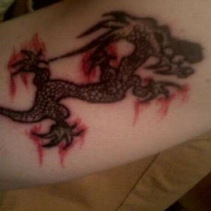 Dragon tattoo on my left arm