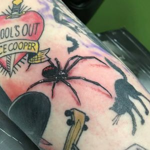 My Alice Cooper black widow and School's Out tattoos 