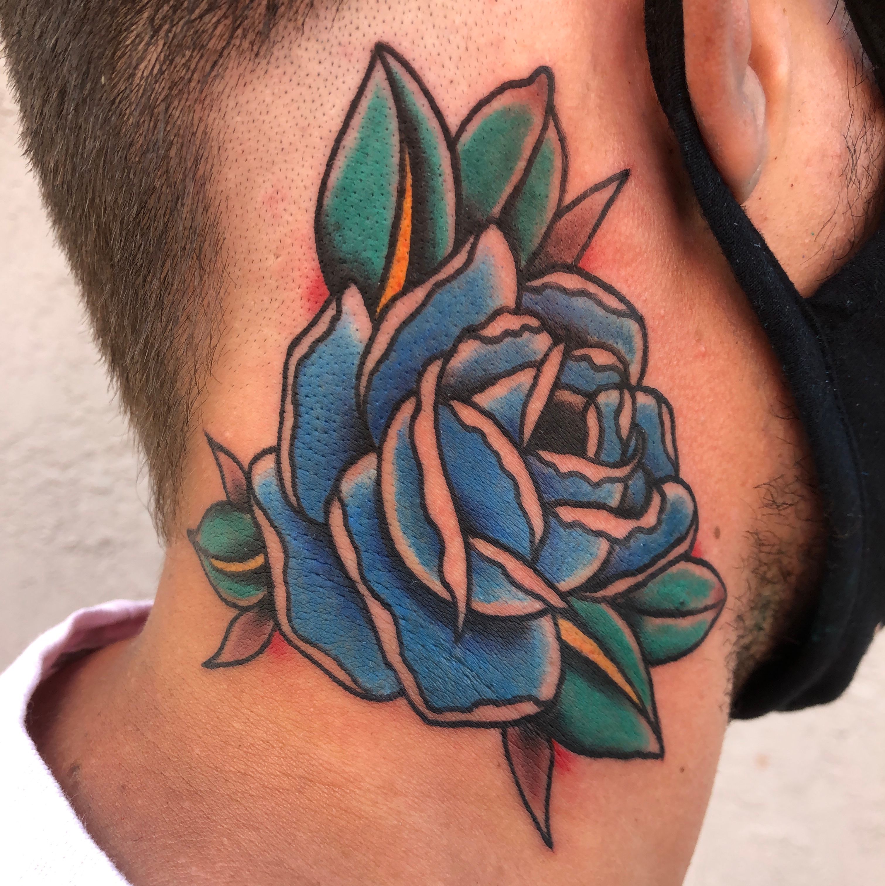 Tattoo uploaded by Dustin Gormley • A bold traditional blue rose. Camron  drove 8 hours to get his neck tattoo tattooed. Thank you for the dedication  🙏 • Tattoodo