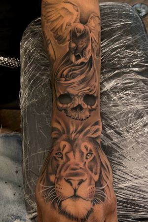 Black and Grey quarter sleeve, Lion blasted on the hand. Hmu wit more like this 