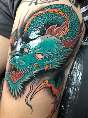 I never get tired of tattoo dragons. This one was made at Newlife Tattoos Campus location in Champaign Illinois 
