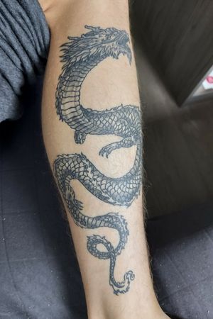 Dragon 4 months after being done #tattoo #dragon #leg #dragontattoo #black #firsttattoo