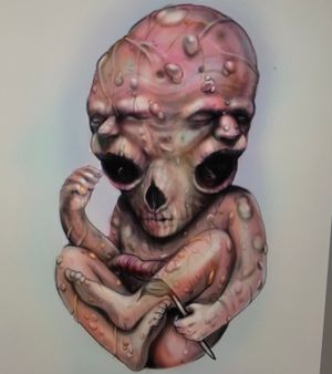 Three headed fetus
