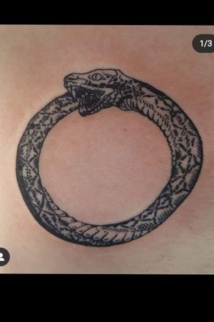 Oroborus Snake, First Tattoo (can't find original photo) 