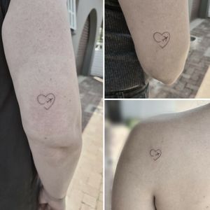Matching heart tattoos. 