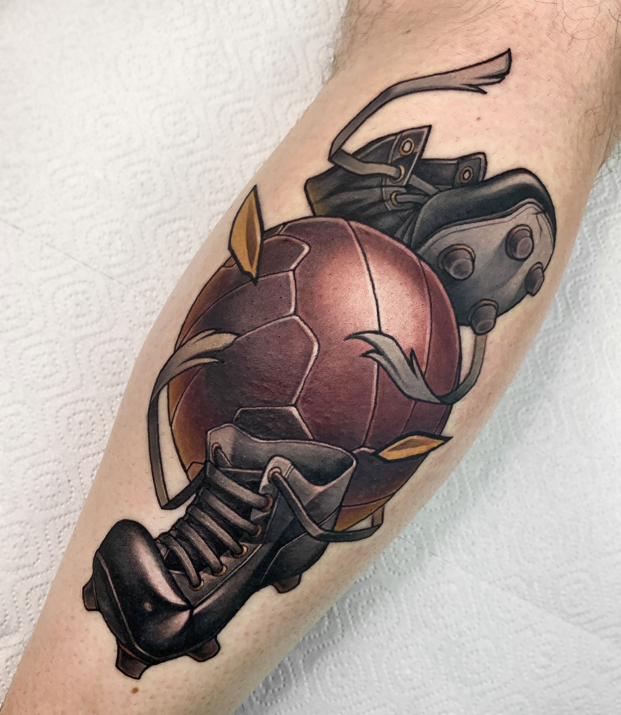 Detailed black and white soccer ball tattoo on Craiyon