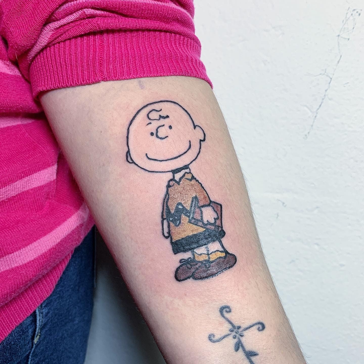Tattoo tagged with: peanuts character, small, fictional character, micro,  charlie brown, playground, tiny, peanuts comic, cartoon, ifttt, little,  wrist, minimalist, film and book, cartoon character | inked-app.com