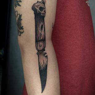 Freehand folding knife tattoo