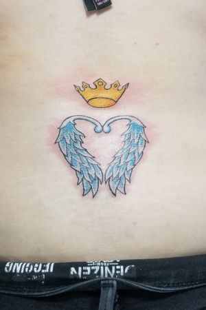 Winged heart with crown on top