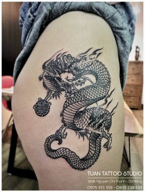 Dragon Tattoo by Artist at TUAN TATTOO STUDIO 👇Contact us: ▪️101A Nguyen Chi Thanh, Da Nang ▪️ Open from 9am to 9pm ▪️ Hotline: 0975 555 559 - 0935 239 539 ▪️ Email: tuantattoo2012@gmail.com ▪️ Web: tuantattoo.com . #dragon #colortattoo #cutetattoo #smalltattoo #tattoodanang #tuantattoo #tattooideas #타투 #여자타투 #레터링타투 #문신 #inked #inkmagazine #베트남여행 #타투디자인 #inkstagram #vietnamtravel #danang #danangtattoo #piercing #danangcity #danangtrip #hanmarket #tattooist #inker #inkcolor #홍대타투샵 #홍대타투 #건대타투