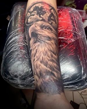 A cool eagle tattoo and soccer logo 