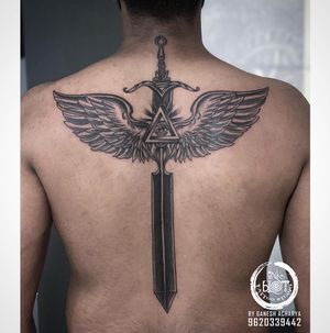 Wings with sword tattoo done by Inkblot tattoos contact :9620339442