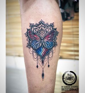 Butterfly with mandala tattoo done by Inkblot tattoos contact :9620339442