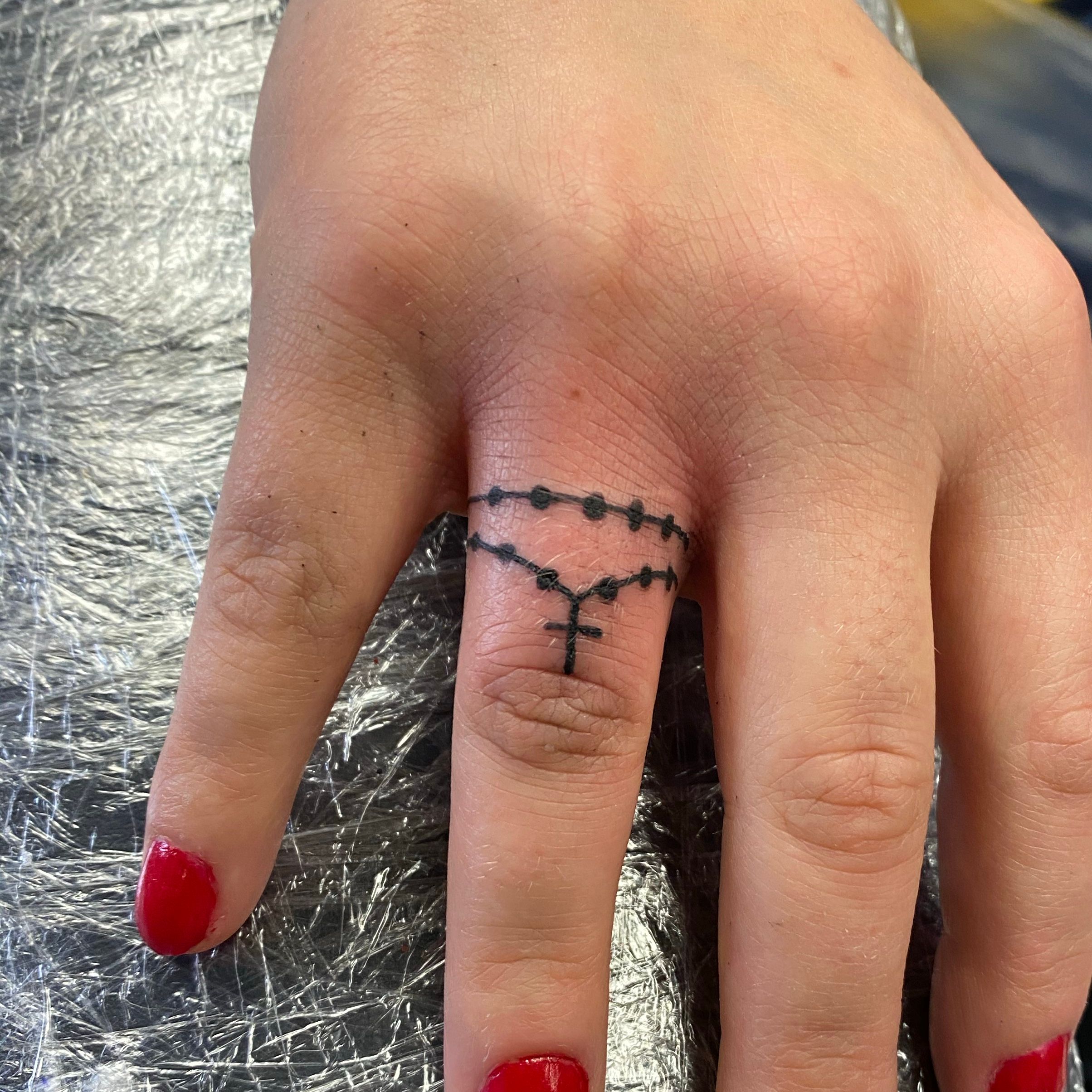 Phils Tattoo Studio  Rosary tattoo on finger rosary rosarytattoo cross  crosstattoo fingertattoo smalltattoos girlstattoo cutetattoos  Tattooistparth philstattoostudio  Facebook