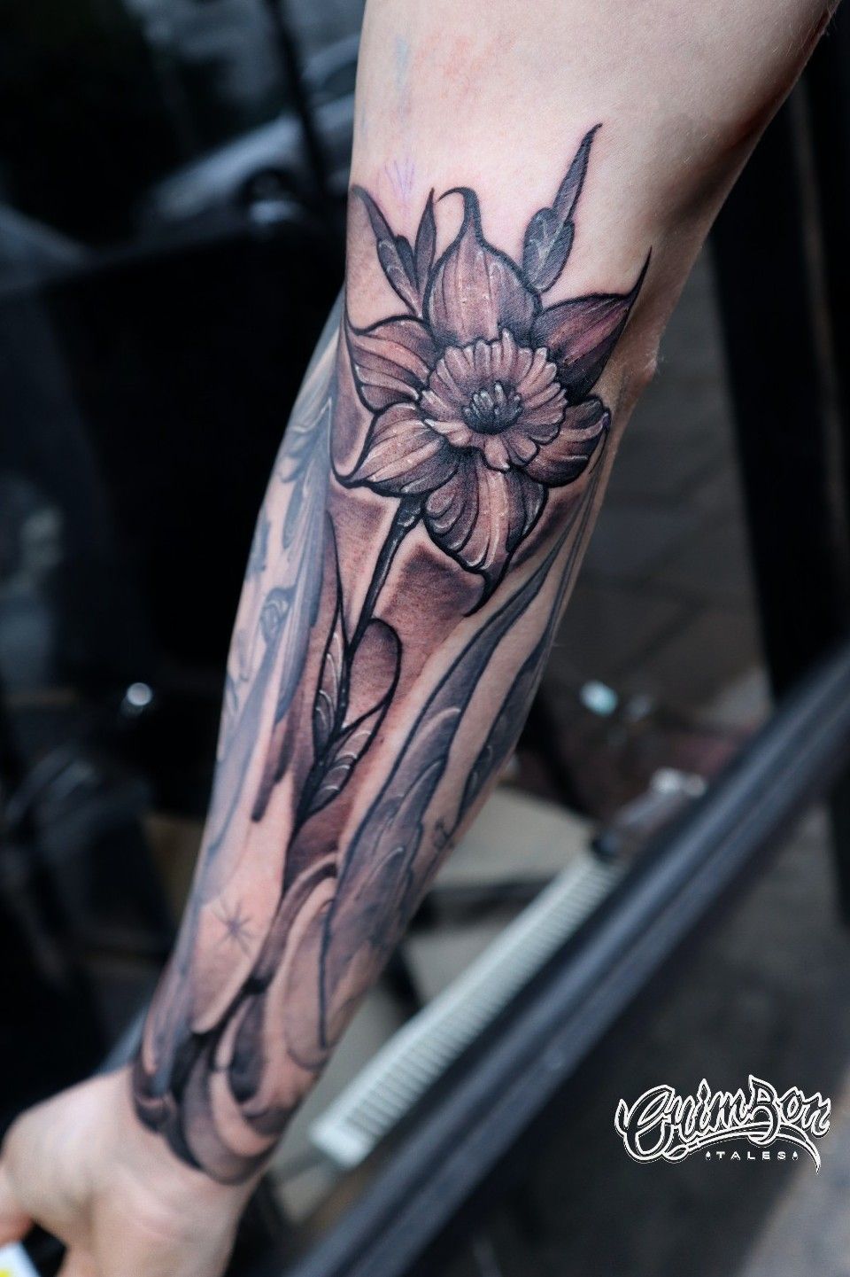 Tattoo uploaded by Crimson Tales London • Daffodil by Naz BOOKINGS VIA DM OR WEBSITE www.crimsontalestattoo.co.uk #daffodiltattoo #daffodil #blackandgraytattoos #neotraditionaltattoos #armtattoo #flowerstattoo #floraltattoo • Tattoodo