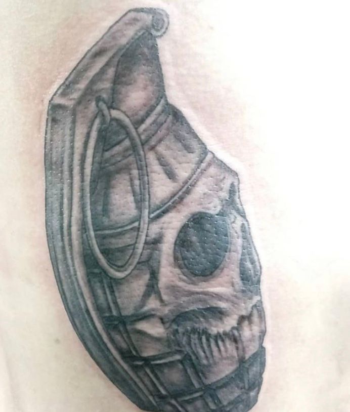 skeleton hand grenade tattoo