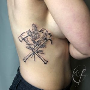 Axe and Wildflower Fine Line Tattoo by Andreanna Iakovidis #blackandgrey #botanical #fineline #adirondack #nature #botanical #wildflower #axe #rib #delicate