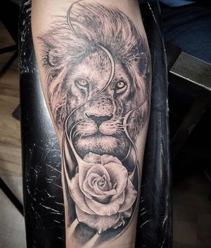 Lion with rose