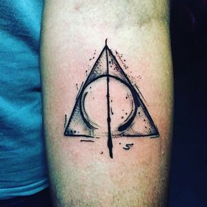 "The Elder Wand. The Resurrection Stone. The Cloak of Invisibility. Together," he said, "the Deathly Hallows."