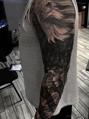 Cover up full sleeve eagle and American flag  black and grey piece done by Jon campos from urbans Tattoo Studio Arlington, Texas