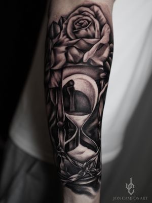 Hourglass and rose half sleeve black and grey tattoo done by Jon campos art. Dallas Tx. 