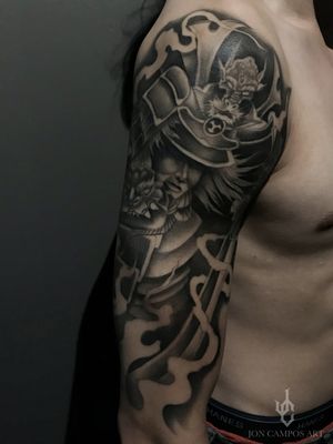 Samurai half sleeve  black and grey piece done by Jon campos from urbans Tattoo Studio Arlington, Texas
