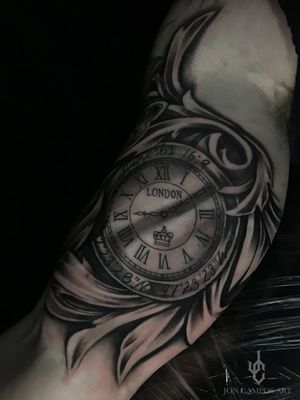 Black and grey clock and filigree tattoo done by Jon campos art. Arlington, Tx. 