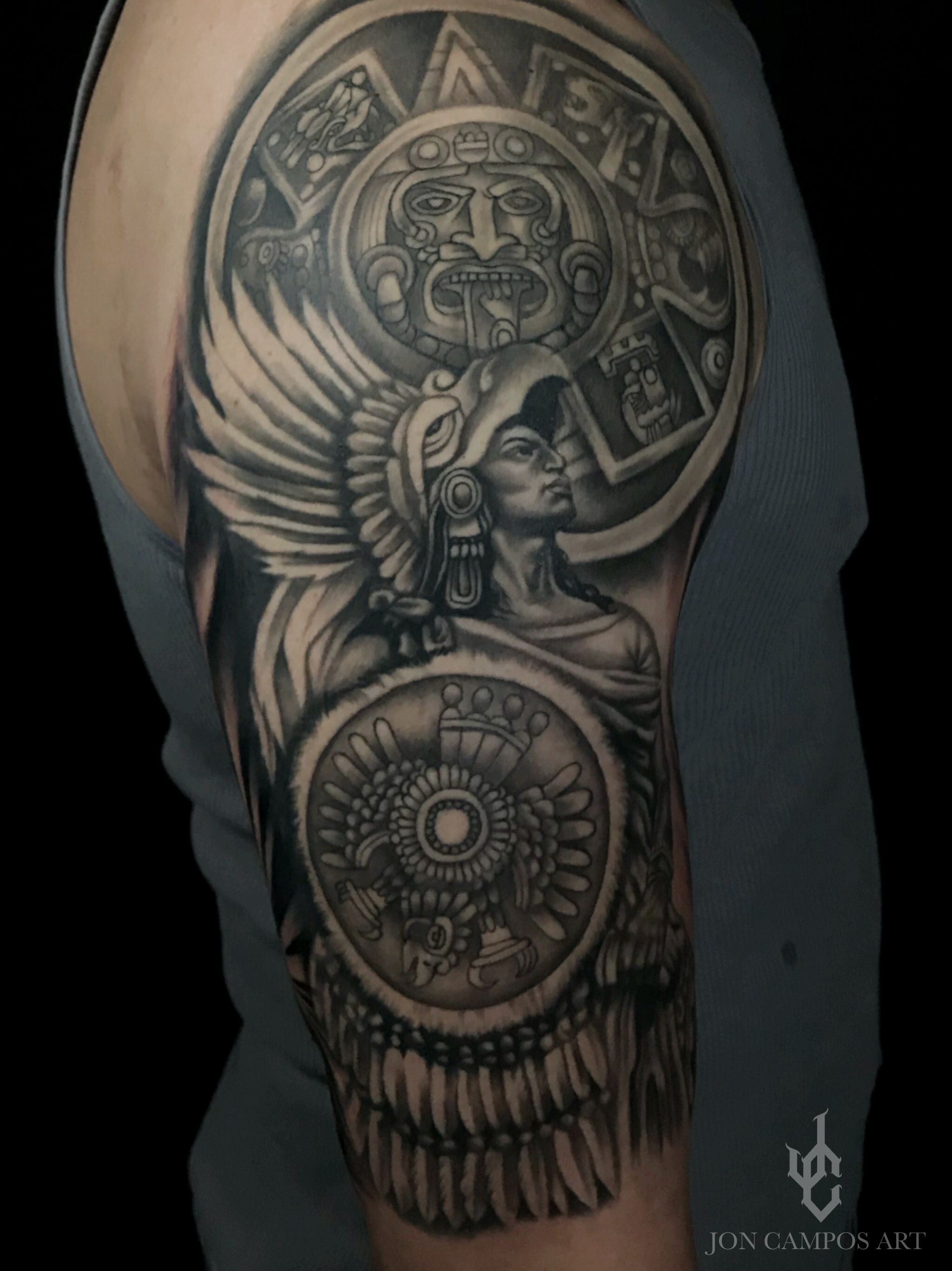 Classic Aztec Tattoo On Man Left Half Sleeve