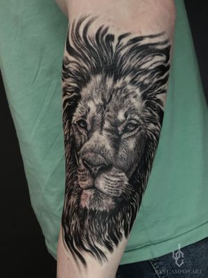 Black and grey lion half sleeve tattoo done by Jon campos art. 