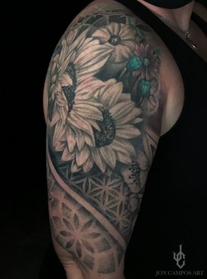 Black and grey half sleeve floral and geometric done by Jon campos art Dallas, Tx. 