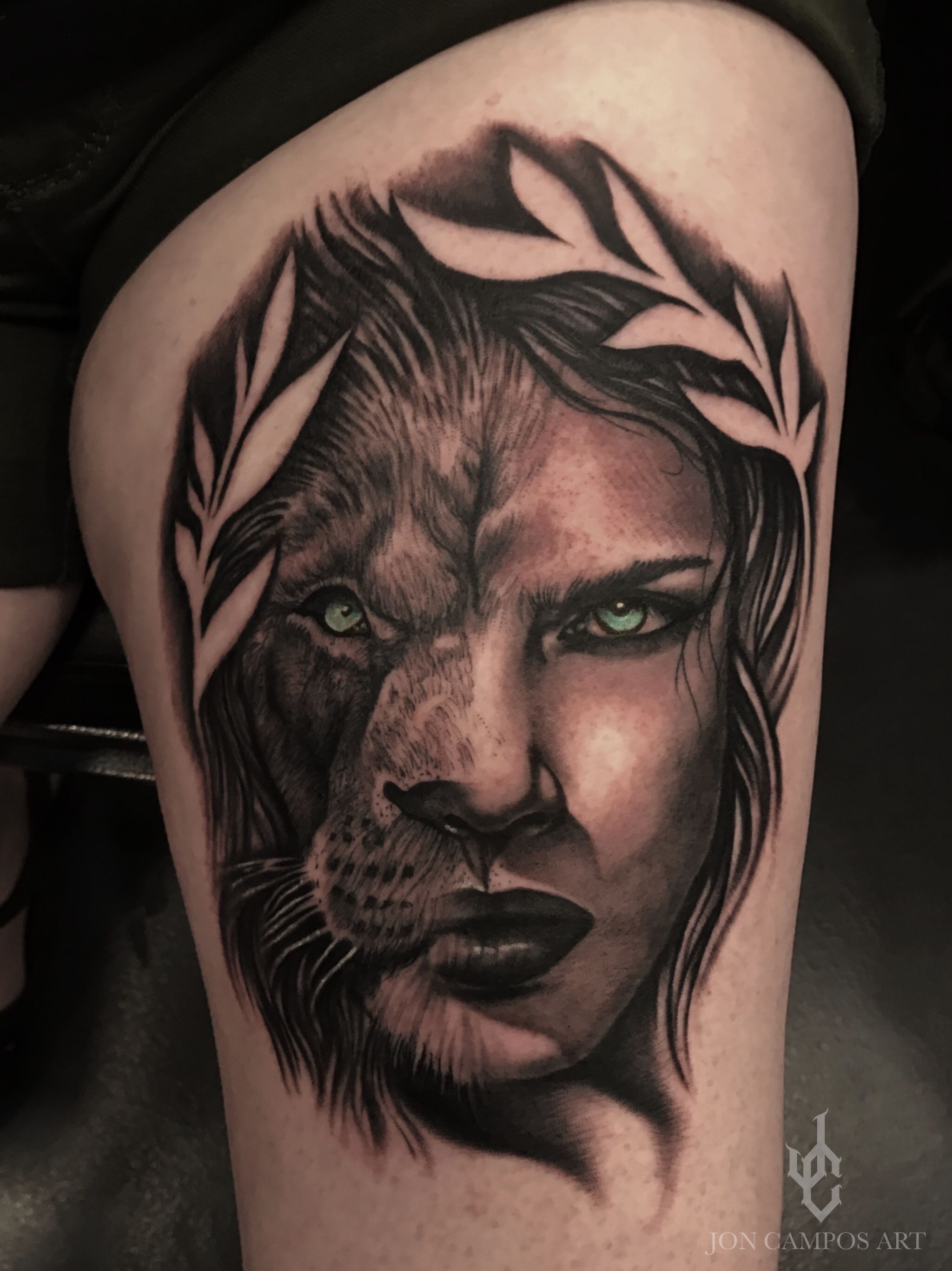 half lion half human face tattoo